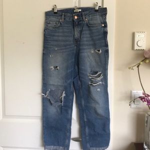 H&M destroyed blue jeans